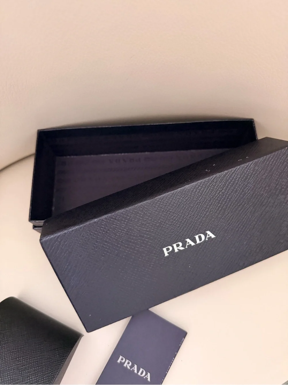 Prada 100% Round Sunglasses in Light Grey with Gold Trim